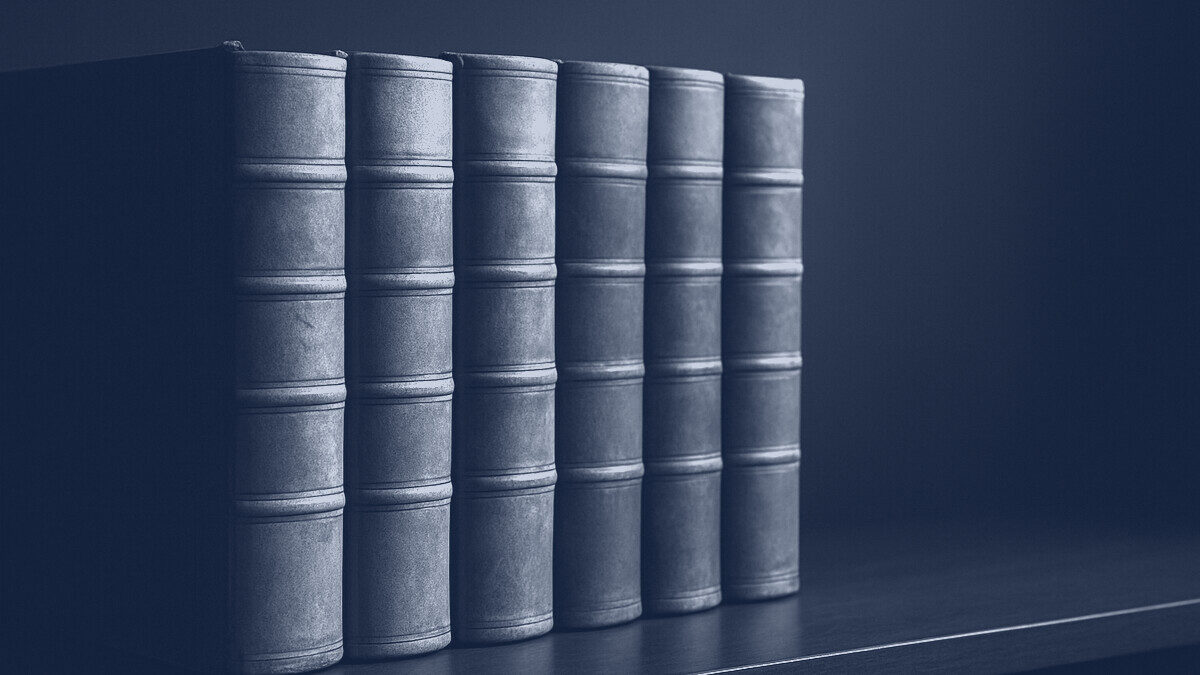 A row of old law reports on a shelf